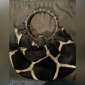 Giorgio Armani hobo hand bag with leather handle and gemstone closure